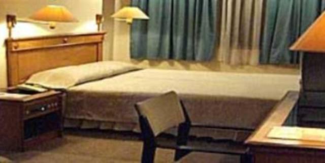 Amans Hotel Ambon Habitación foto